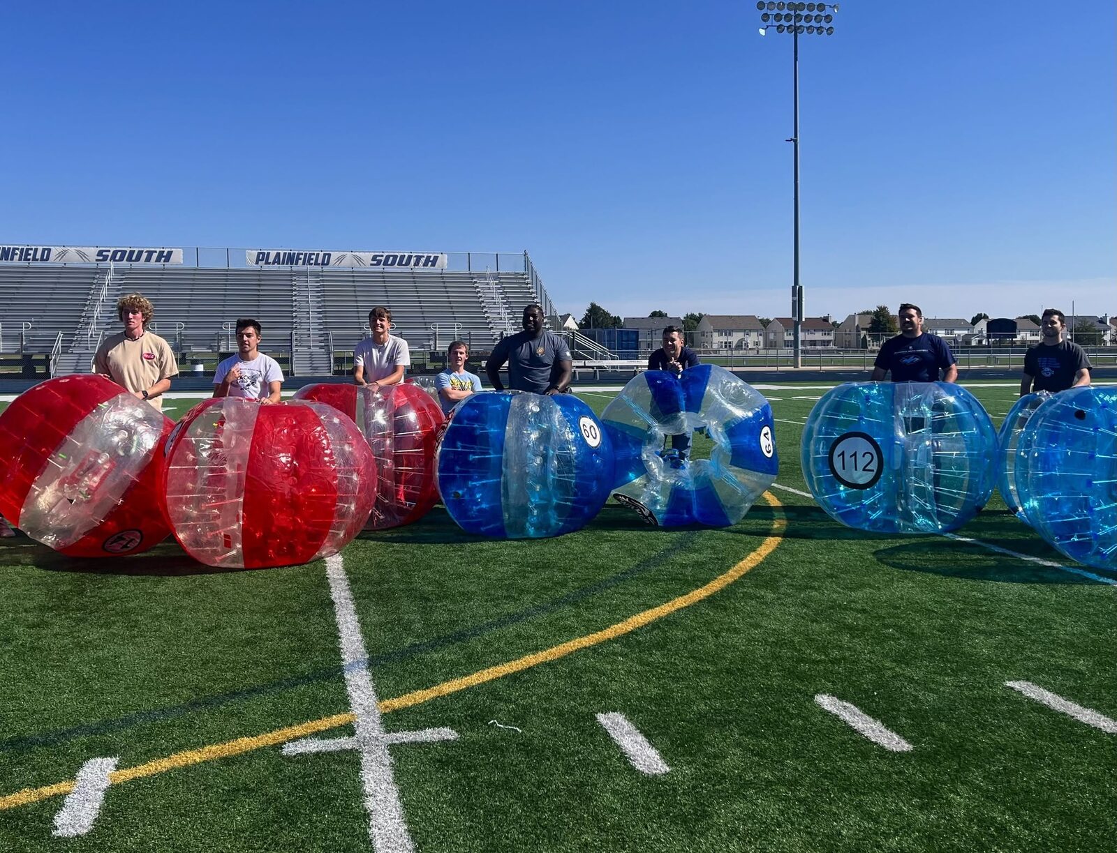 Bubble soccer at a school field