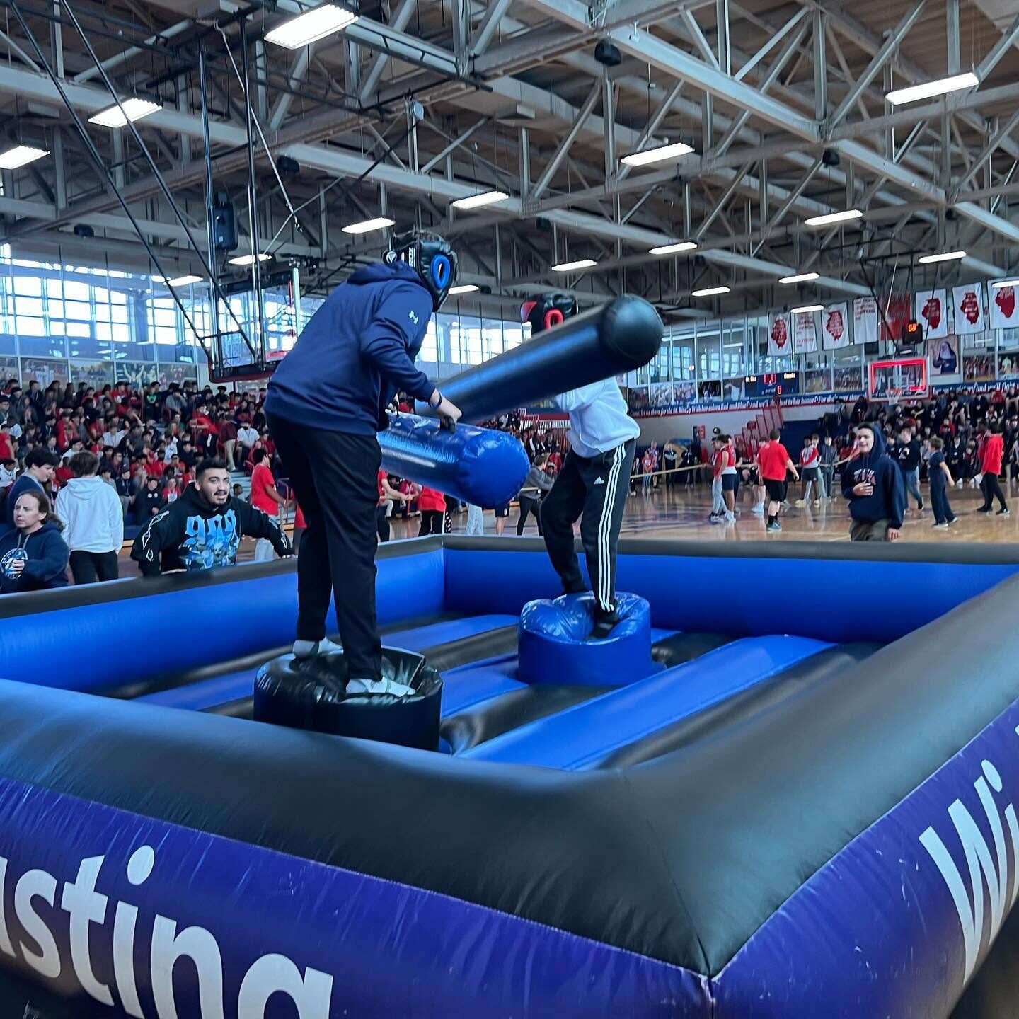 Inflatable jousting at a school gym